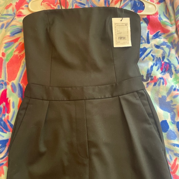 Theory jumpsuit . Never worn with tags . Size 4